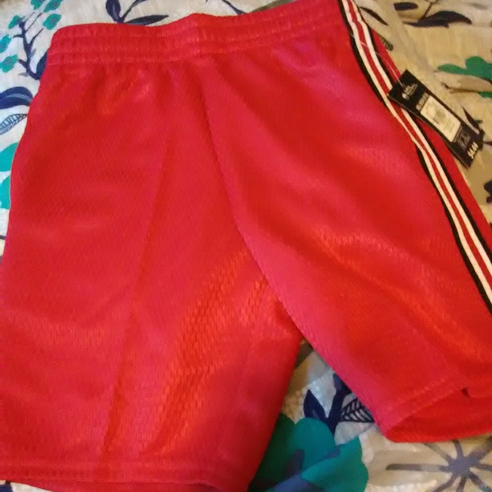 Red with black,red and white stripe down the side
